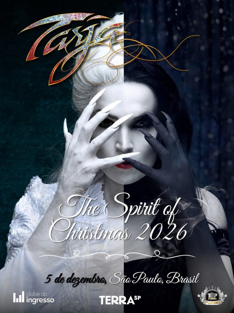 Cartaz promocional do show da cantora finlandesa Tarja Turunen, intitulado "The Spirit of Christmas 2026". A imagem traz uma composição dividida verticalmente em duas metades contrastantes: o lado esquerdo é claro, com a artista de cabelos brancos, maquiagem clara, unhas góticas brancas e roupa branca; o lado direito é escuro, com cabelos pretos, maquiagem sombria, unhas pretas e traje preto. Em ambas as metades, a cantora posiciona as mãos espalmadas à frente do rosto. No topo, destaca-se o logotipo brilhante do nome "Tarja". No centro, lê-se em fonte cursiva "The Spirit of Christmas 2026". Na parte inferior, consta a data "5 de dezembro, São Paulo, Brasil", acompanhada pelas marcas do Clube do Ingresso, Terra SP e Top Link Music.