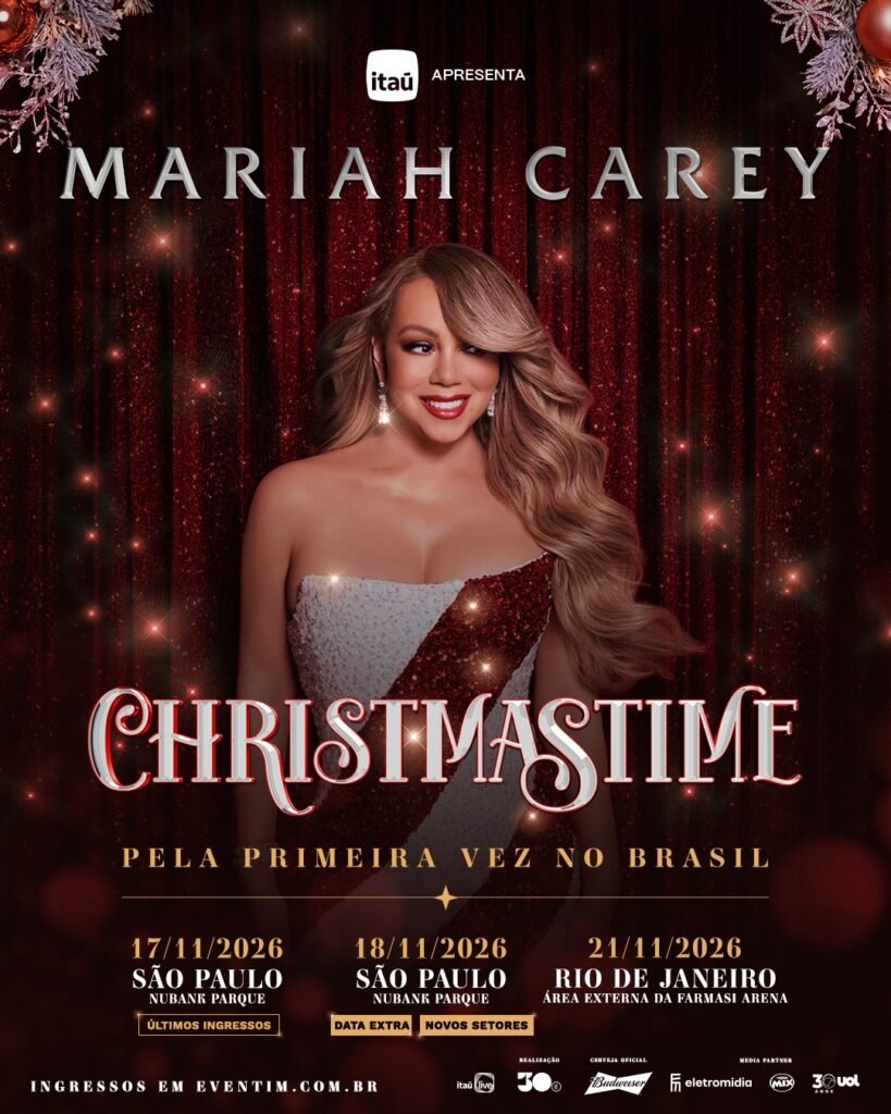 Cartaz promocional do espetáculo de Natal "CHRISTMASTIME - Pela Primeira Vez no Brasil", da cantora Mariah Carey, apresentado por Itaú. No centro, a artista sorri com cabelos loiros ondulados e vestido tomara que caixa reluzente em padrões espiralados de paetês brancos e vermelhos. O fundo apresenta uma cortina de veludo vermelho com luzes brilhantes e folhagens natalinas prateadas nos cantos superiores. O nome "MARIAH CAREY" aparece no topo em letras prateadas e elegantes. Na parte inferior, constam as datas e locais dos shows: 17/11/2026 em São Paulo no Nubank Parque ("Últimos Ingressos"), 18/11/2026 em São Paulo no Nubank Parque ("Data Extra / Novos Setores") e 21/11/2026 no Rio de Janeiro na Área Externa da Farmasi Arena. Vendas pelo site da Eventim. No rodapé, destacam-se as marcas Itaú Live, Budweiser, Eletromidia, Rádio Mix e 30e.